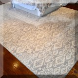 D19. Wool patterned gray rug. 9' x 13' - $350 